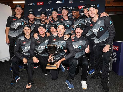 New Zealand players celebrate a 2-0 series win after the third Twenty20 International cricket match between New Zealand and the West Indies was abandoned due to rain at the Bay Oval in Mount Maunganui on November 30, 2020.