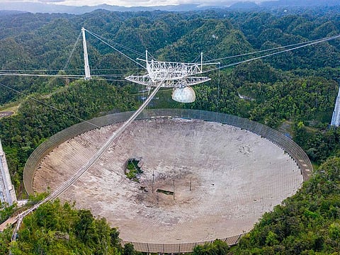 File photo: An aerial view shows a hole in the dish panels of the Arecibo Observatory in Arecibo, Puerto Rico.