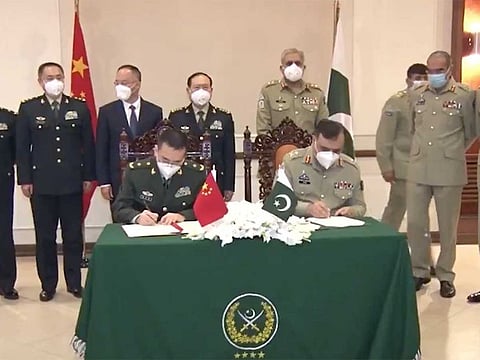 China’s Defence Minister General Wei Fenghe and Pakistan Army Chief General Qamar Javed Bajwa attend the signing of Pakistan-China defence cooperation pact in Islamabad on November 30.