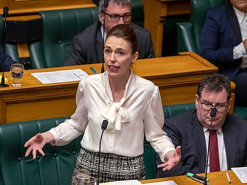 New Zealand's Prime Minister Jacinda Ardern moves a motion in the Parliament House in Wellington, New Zealand, to declare a climate emergency, Wednesday, Dec. 2, 2020. Joining more than 30 other countries around the world, New Zealand took the symbolic step of declaring a climate emergency.