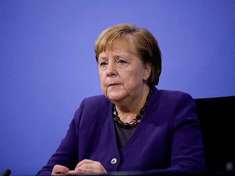 German Chancellor Angela Merkel addresses a press conference following talks via video conference with Germany's state premiers on coronavirus restrictions at the Chancellery in Berlin on December 2, 2020.