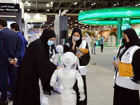 Delegates and visitors at the DEWA pavilion at Gitex.
