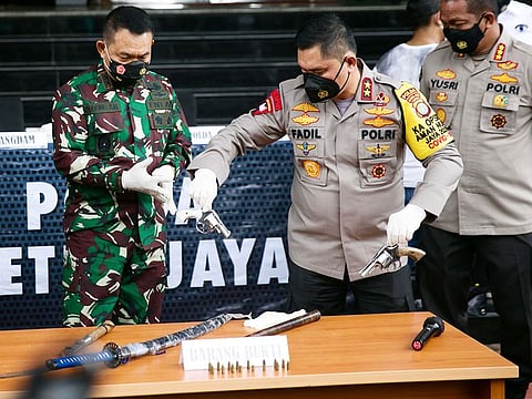 Police show weapons used by supporters of cleric Rizieq Shihab who were killed in a shoot out after a violent clash with police in Jakarta on December 7, 2020.