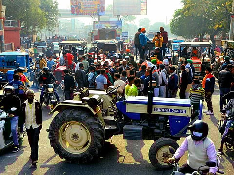India: Farmers protest with their tractors in support of the nationwide strike called by Farmer unions