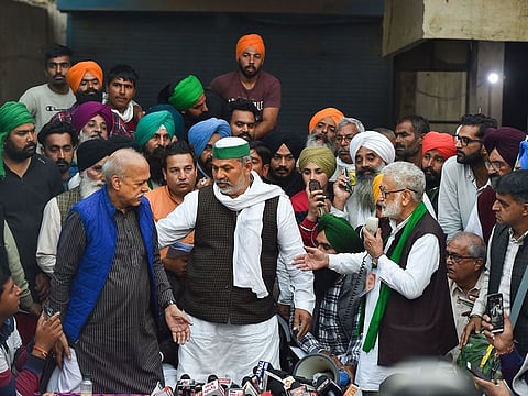 Farmer leaders address media after a meeting near Singhu border in New Delhi on Wednesday.