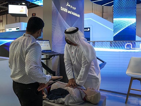 Visitors at the DHA stand during GITEX Technology Week, at Dubai World Trade Center on Tuesday.