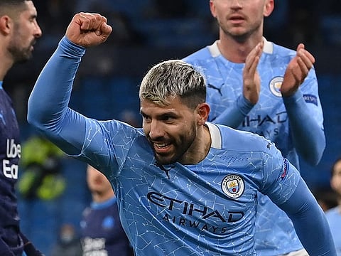 Manchester City striker Sergio Aguero celebrates after he scores his team's second goal.