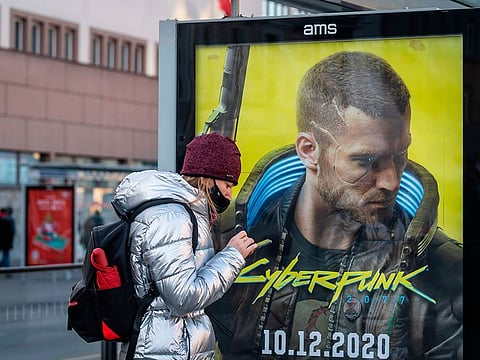 An advertisment of Cyberpunk 2077 game is seen on December 4, 20202 before the expected release of Cyberpunk 2077 game, in Warsaw, Poland.