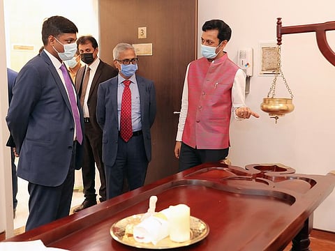 Dr. Shyam Vishwanathan explaining about the traditional curative therapies offered at ‘Vaidyashala’ to Sandeep Kumar Bayyapu after the inauguration.
