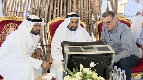 Dr Sheikh Sultan watches a preview of the film.