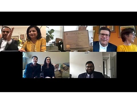 The couples watch their children wed via Zoom.