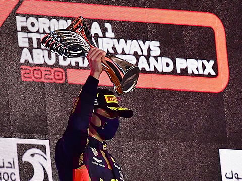 Max Verstappen celebrates his win in Abu Dhabi