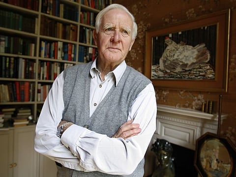Author John Le Carre poses for a photo at his home in London in 2008.