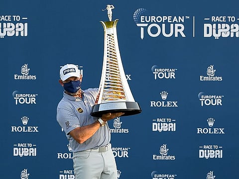 Lee Westwood, posing with the 2020 Race to Dubai trophy, will be back in Dubai along with a host of British stalwarts for the Omega Dubai Desert Classic later this month.