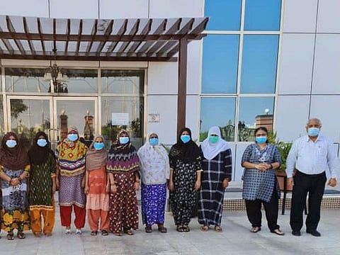 Roop Sidhu (right) and Chaya Devi (second from right) with some of the rescued women