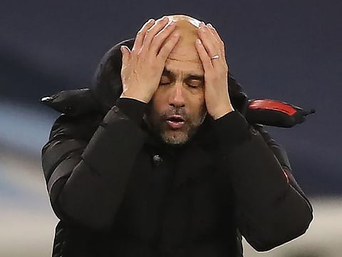 Pep Guardiola reacts during the English Premier League football match between Manchester City and West Bromwich Albion.