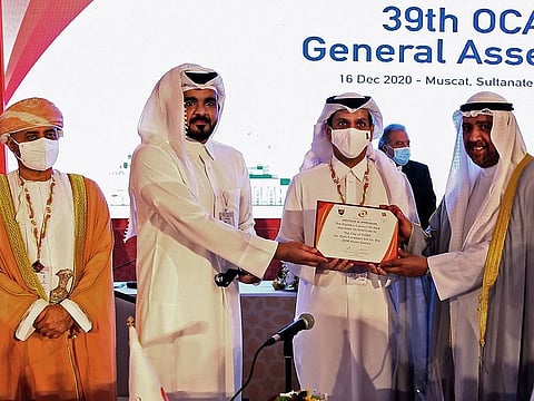 Chairman of Qatar Olympic Committee Sheikh Joaan bin Hamad al-Thani (2nd L) and Minister of Foreign Affairs Sheikh Mohammed bin Abdulrahman al-Thani (2nd R) are pictured during the 39th Olympic Council of Asia (OCA) General Assembly Meeting in Muscat after Doha was selected as host city for 2030 Asian Games.