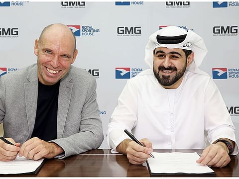 Mohammad A. Baker, CEO of GMG, and Regis Schultz, Director of RSH, sign off on the deal that gives GMG access to an additional 200 plus store network in Asia as well as in Egypt.