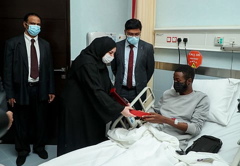 Physicians attend a cancer patient at the day care centre.
