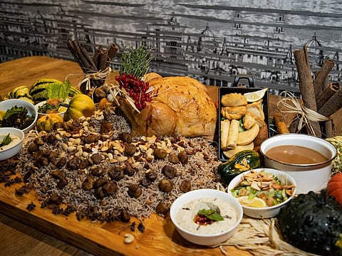 Roast turkey a la Lebanon: Spice-rubbed turkey laid on a bed of rice and chestnuts