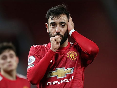 Manchester United's Bruno Fernandes celebrates scoring their third goal against Leeds.