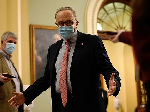 Senate Minority Leader Charles Schumer answers reporters questions saying there will likely be a COVID-19 relief bill vote later on Capitol Hill Washington, D.C., U.S. Sunday, December 20, 2020.