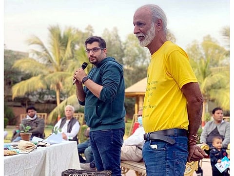Senior official of Karachi Metropolitan Corporation, Taha Saleem, speaks at the workshop to promote kitchen gardening by using household waste.
