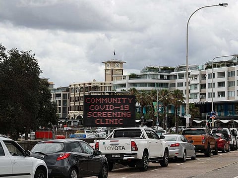 Vehicles queue at the Bondi Beach drive-through coronavirus disease (COVID-19) testing centre in the wake of an outbreak in Sydney, Australia, December 22, 2020.
