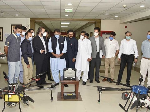 Federal Minister for Science & Technology Fawad Chaudhry introduces Pakistan-made drones to fight the locust attack.