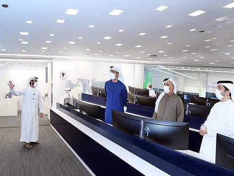 Mattar Mohammed Al Tayer and Abdullah Mohammed Al Basti being briefed on the RTA's smart monitoring systems.