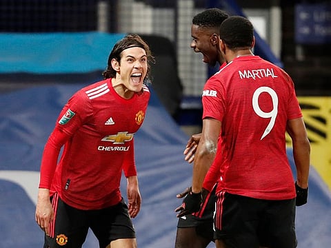 Manchester United's Edinson Cavani celebrates scoring.