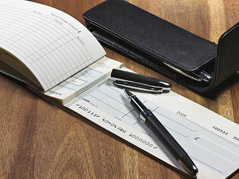 Dh447,000 was transferred to the defendant's personal account using cheques with forged signatures. Picture for illustrative purposes.