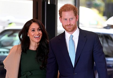 FILE PHOTO: Britain's Prince Harry and Meghan, Duchess of Sussex, arrive to attend the WellChild Awards Ceremony in London, Britain, October 15, 2019. REUTERS/Toby Melville/File Photo