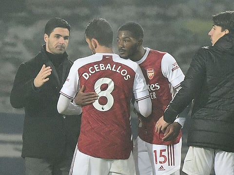 Arteta congratulates his Arsenal players following the win over West Brom.