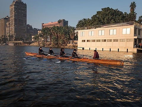 Rowers on the Nile river in Cairo, Dec. 26, 2020. Ancient pharoahs rowed the Nile. Now Egyptians are rediscovering the river that has shaped and nourished the country throughout its history.