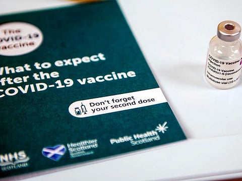 A vial of the Oxford-AstraZeneca COVID-19 vaccine is pictured at the Lochee Health Centre in Dundee, Scotland, on January 4, 2021