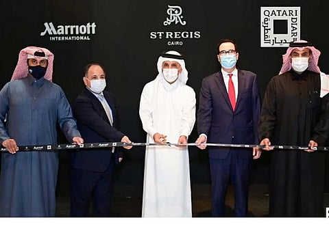 Qatari, Egyptian and US officials open Nile hotel in Cairo.