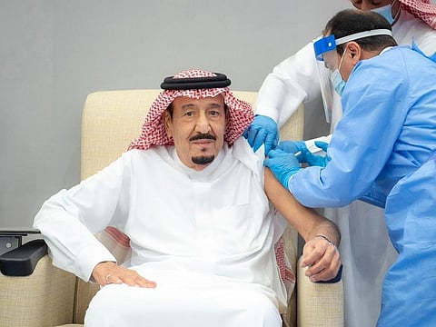 King Salman takes a vaccine shot
