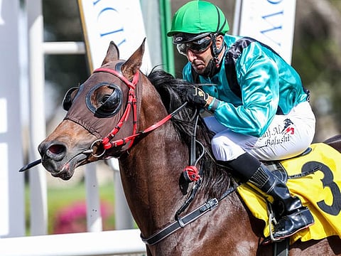 Omani jockey Saif Al Balushi winning Dr Hussain Habib Al Redha Trophy, sponsored By Shadwell aboard Al Suhooj at Jebel Ali Racecourse on Friday.