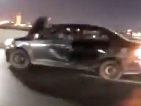 The driver with his hood open in Jeddah.