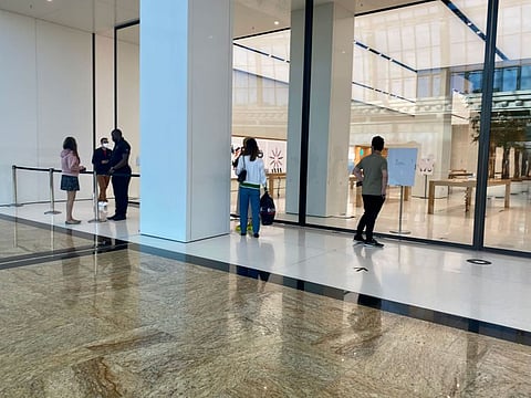 Apple's store at Mall of the Emirates is only partially open, to serve those who had already paid and have come to collect the orders.