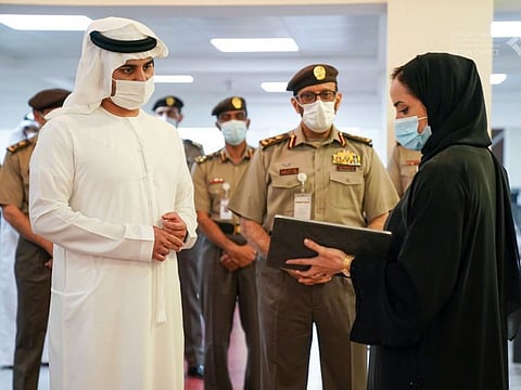 Sheikh Maktoum bin Mohammed at the GDRFA headquarters.