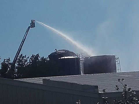 Sharjah Civil Defence controlled a fire which broke out in a tank in an abandoned warehouse.