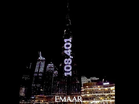 Burj Khalifa, the world’s tallest tower, lit up in Dubai on Tuesday night to honour the UAE leaders and frontline health-care workers for successfully administering a record 108,401 vaccines in a single day on January 12, Tuesday.