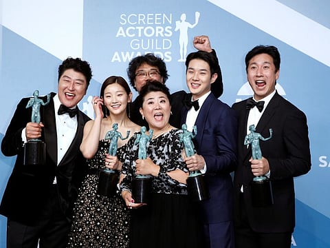 The cast of "Parasite" poses backstage with their Outstanding Performance by a Cast in a Motion Picture award at the 26th Screen Actors Guild Awards, Los Angeles, California, US, on January 19, 2020.