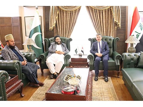 Prime Ministers special advisor on religious harmony and the Middle East Tahir Mahmood Ashrafi (center) during a meeting with Ambassador of Iraq Hamid Abbas Lafta (right).