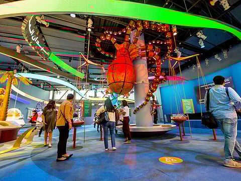 Members of the media tour the Sustainability Pavilion at the Dubai Expo Site.