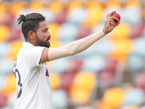 India's Mohammed Siraj gestures with the ball as he leaves the field after taking five wickets during play on day four of the fourth Test vs Australia at the Gabba, Brisbane.