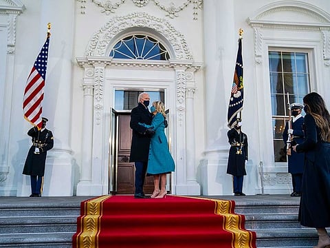 President Joe Biden and first lady Jill Biden embrace before entering the White House on Inauguration Day in Washington, Jan. 20, 2021. Timothy Harleth, a former employee of the Trump International Hotel in Washington, was fired from his post as the White House's chief usher earlier that day.