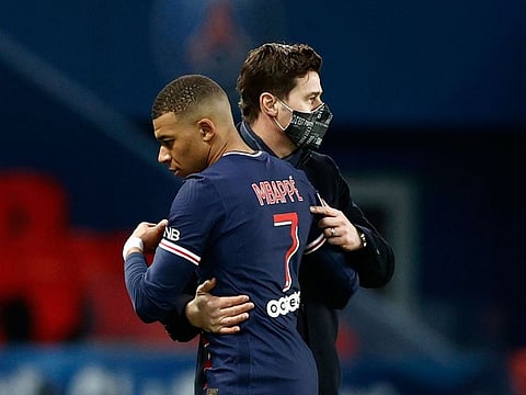 Kylian Mbappe with Paris St-Germain boss Mauricio Pochettino